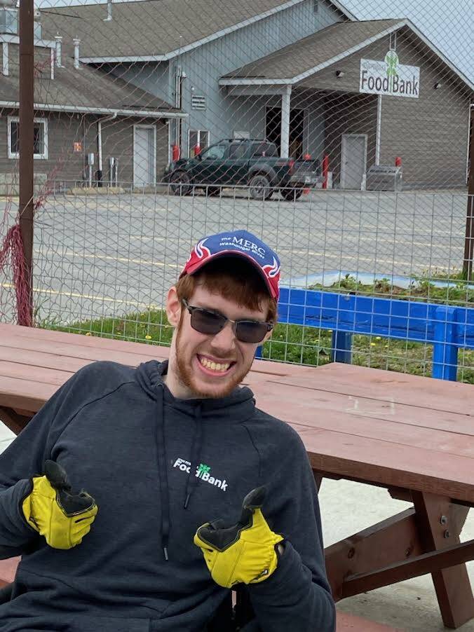 Coen Braxling outside of the Kenai Peninsula Food Bank, where he worked as part of KPBSDs Summer Work Program. (Courtesy photo)