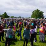 Countless attendees fill the softball greenstrip in Kenai, Alaska, during Fourth of July festivities on Tuesday, July 4, 2023. (Jake Dye/Peninsula Clarion)