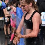 Anchorages Eden Rinner washes off after the girls junior Mount Marathon Race on Tuesday, July 4, 2023, in Seward, Alaska. (Photo by Jeff Helminiak/Peninsula Clarion)