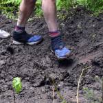 Racers climb in mud during the mens Mount Marathon Race on Tuesday, July 4, 2023, in Seward, Alaska. (Photo by Jeff Helminiak/Peninsula Clarion)