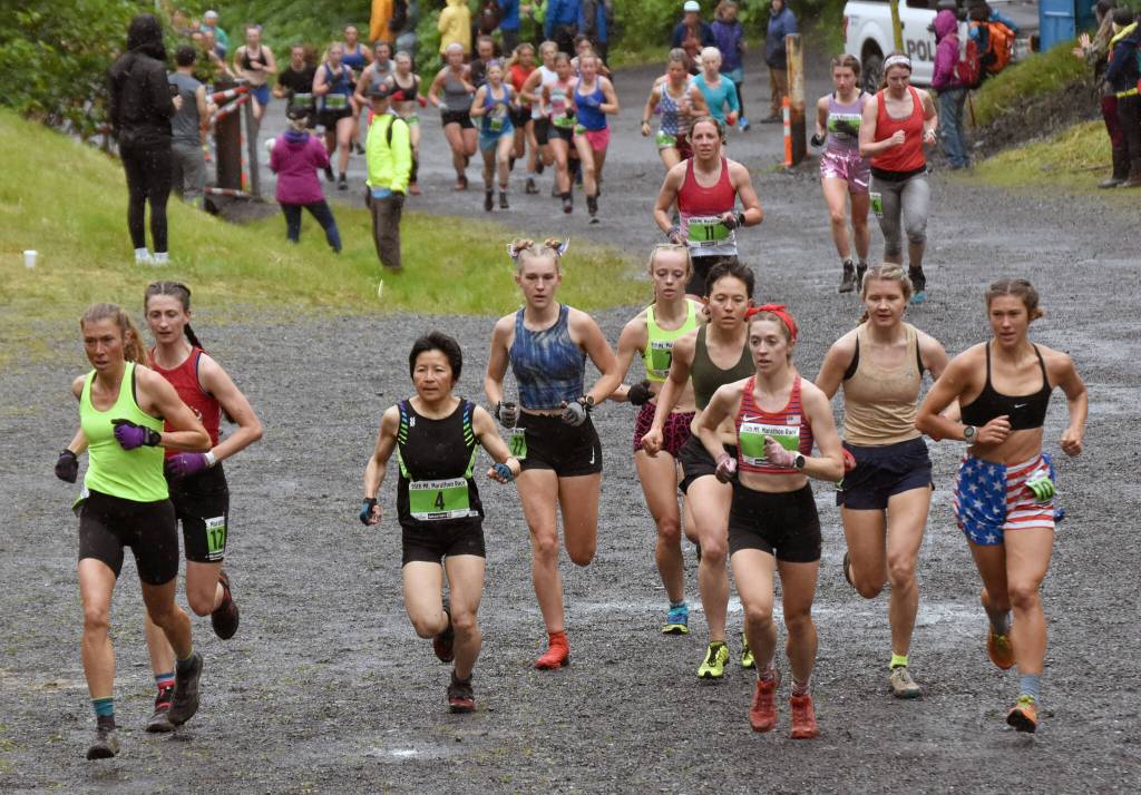 Eventual race winner Christy Marvin leads the pack to the mountain in the womens Mount Marathon Race on Tuesday, July 4, 2023, in Seward, Alaska. (Photo by Jeff Helminiak/Peninsula Clarion)