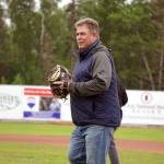 Brian Gabriel, mayor of Kenai, readies to catch the ceremonial first pitch before a game between the Peninsula Oilers and the Mat-Su Miners on Tuesday, July 4, 2023, at Coral Seymour Memorial Park in Kenai, Alaska. (Jake Dye/Peninsula Clarion)