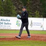 Lisa Parker, vice mayor of Soldotna, readies to throw the ceremonial first pitch before a game between the Peninsula Oilers and the Mat-Su Miners on Tuesday, July 4, 2023, at Coral Seymour Memorial Park in Kenai, Alaska. (Jake Dye/Peninsula Clarion)