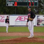 Ryan Brown readies a ball during a game between the Peninsula Oilers and the Mat-Su Miners on Tuesday, July 4, 2023, at Coral Seymour Memorial Park in Kenai, Alaska. (Jake Dye/Peninsula Clarion)