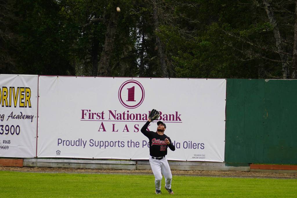 Nick Costello catches a ball deep in the outfield during a game between the Peninsula Oilers and the Mat-Su Miners on Tuesday, July 4, 2023, at Coral Seymour Memorial Park in Kenai, Alaska. (Jake Dye/Peninsula Clarion)