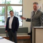 Gov. Mike Dunleavy (right) delivers opening remarks at a bill signing event at Twin Cities Veterinary Clinic on Thursday, July 6, 2023 in Soldotna, Alaska. (Ashlyn OHara/Peninsula Clarion)