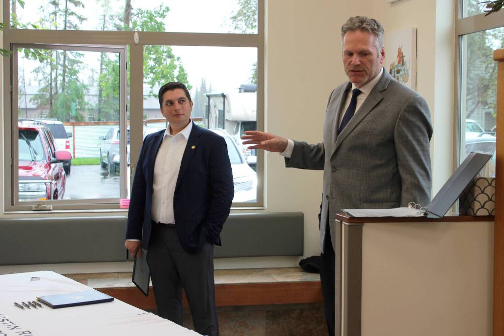 Gov. Mike Dunleavy (right) delivers opening remarks at a bill signing event at Twin Cities Veterinary Clinic on Thursday, July 6, 2023 in Soldotna, Alaska. (Ashlyn OHara/Peninsula Clarion)