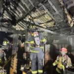 Kachemak Emergency Services and Homer Volunteer Fire Department personnel work to extinguish a fire inside the Fritz Creek General Store east of Homer on East End Road, early Thursday morning on July 6, 2023 in Fritz Creek, Alaska. Photo by Mark Kirko