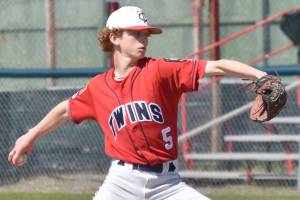 Legion Twins pitcher Malakai Olson delivers to Chugiak on Sunday, July 9, 2023, at Coral Seymour Memorial Park in Kenai, Alaska. (Photo by Jeff Helminiak/Peninsula Clarion)