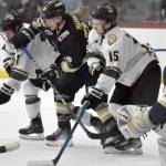 Janesville (Wisconsin) Jets forward Jaden Johnson, Kenai River Brown Bears forward Bryce Monrean, Janesville forward Parker Mabbett and Kenai River forward Hunter Newhouse battle for the puck in front of Janesville goalie Peter Sterling on Saturday, Feb. 25, 2023, at the Soldotna Regional Sports Complex in Soldotna, Alaska. (Photo by Jeff Helminiak/Peninsula Clarion)