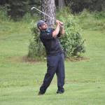 Zac Cowan hits his approach on No. 18 on Sunday, July 16, 2023, at the Kenai Peninsula Open at Birch Ridge Golf Course in Soldotna, Alaska. (Photo by Jeff Helminiak/Peninsula Clarion)
