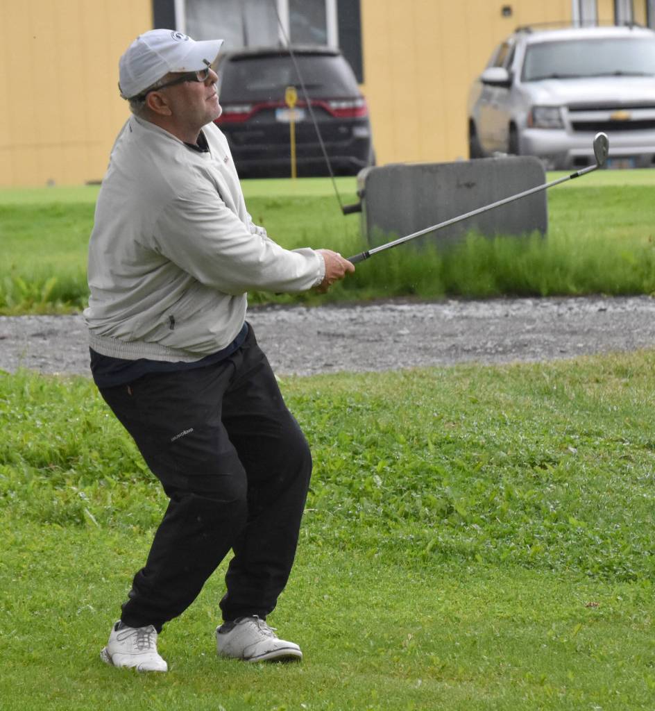Rich Lundahl chips onto the green on No. 18 during the Kenai Peninsula Open on Sunday, July 16, 2023, at Birch Ridge Golf Course in Soldotna, Alaska. (Photo by Jeff Helminiak/Peninsula Clarion)