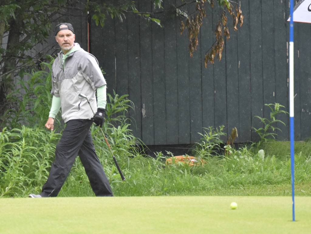 Nolan Rose chips onto the 18th green at the Kenai Peninsula Open on Sunday, July 16, 2023, at Birch Ridge Golf Course in Soldotna, Alaska. (Photo by Jeff Helminiak/Peninsula Clarion)