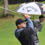 Shane Sundberg hits his approach to the No. 18 green at the Kenai Peninsula Open on Sunday, July 16, 2023, at Birch Ridge Golf Course in Soldotna, Alaska. (Photo by Jeff Helminiak/Peninsula Clarion)