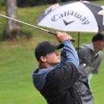 Shane Sundberg hits his approach to the No. 18 green at the Kenai Peninsula Open on Sunday, July 16, 2023, at Birch Ridge Golf Course in Soldotna, Alaska. (Photo by Jeff Helminiak/Peninsula Clarion)