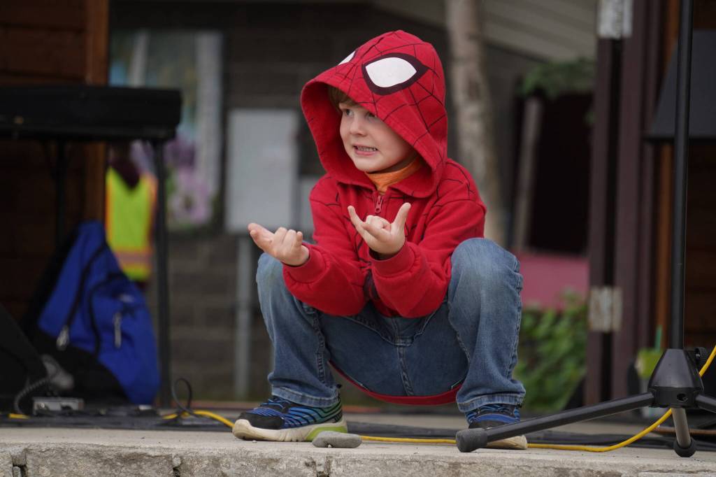 Kenneth Painter, as Spider-Man, participates in the Kenai Performers Cosplay Contest, part of the Progress Days Fair at Soldotna Creek Park in Soldotna, Alaska, on Friday, July 21, 2023. (Jake Dye/Peninsula Clarion)