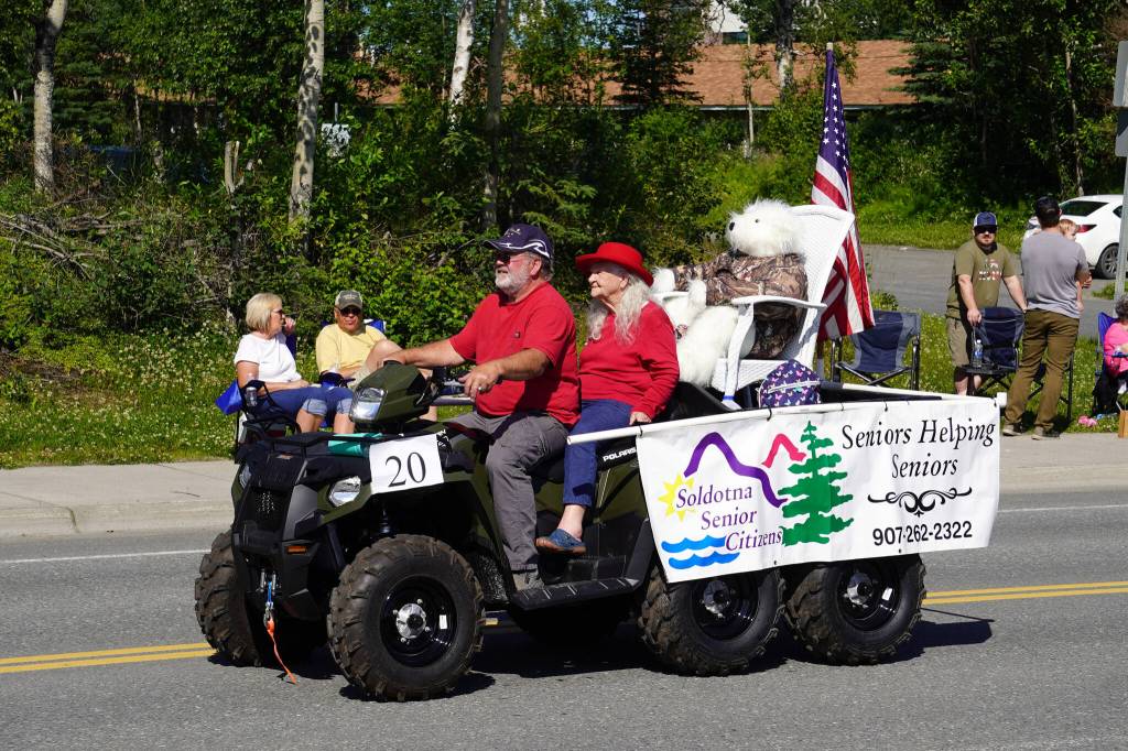 Representatives of Soldotna Senior Citizens proceed down Binkley Avenue in Soldotna, Alaska, part of the Progress Days Parade on Saturday, July 22, 2023. (Jake Dye/Peninsula Clarion)