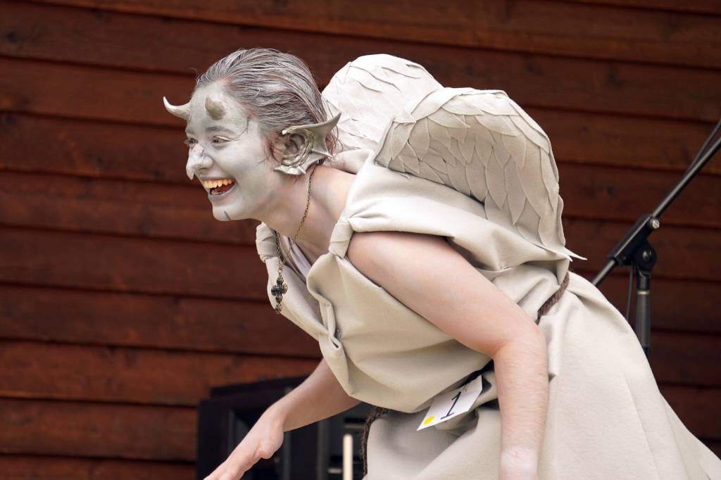 Maria Salzetti, as a gargoyle, participates in the Kenai Performers Cosplay Contest, part of the Progress Days Fair at Soldotna Creek Park in Soldotna, Alaska, on Friday, July 21, 2023. (Jake Dye/Peninsula Clarion)