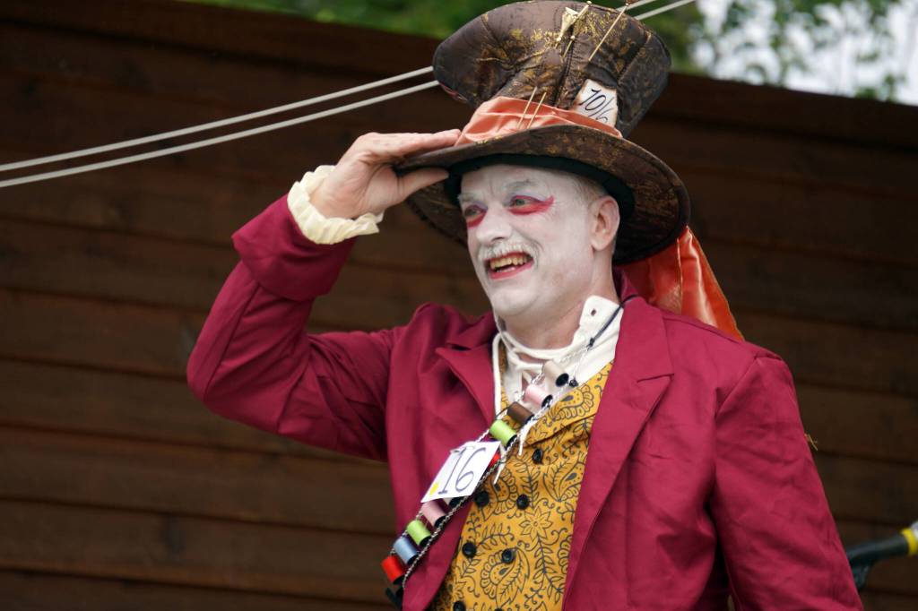 Daniel Faust, as the Mad Hatter, participates in the Kenai Performers Cosplay Contest, part of the Progress Days Fair at Soldotna Creek Park in Soldotna, Alaska, on Friday, July 21, 2023. (Jake Dye/Peninsula Clarion)