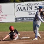 Shaun Montoya of the Anchorage Glacier Pilots turns a double play in front of Michael Elko of the Peninsula Oilers on Saturday, July 22, 2023, at Coral Seymour Memorial Park in Kenai, Alaska. (Photo by Jeff Helminiak/Peninsula Clarion)