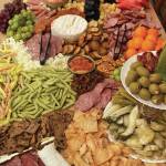 A grazing board, also known as a charcuterie board, is prepared Saturday, July 22, 2023, in Kenai, Alaska. (Photo by Tressa Dale/Peninsula Clarion)