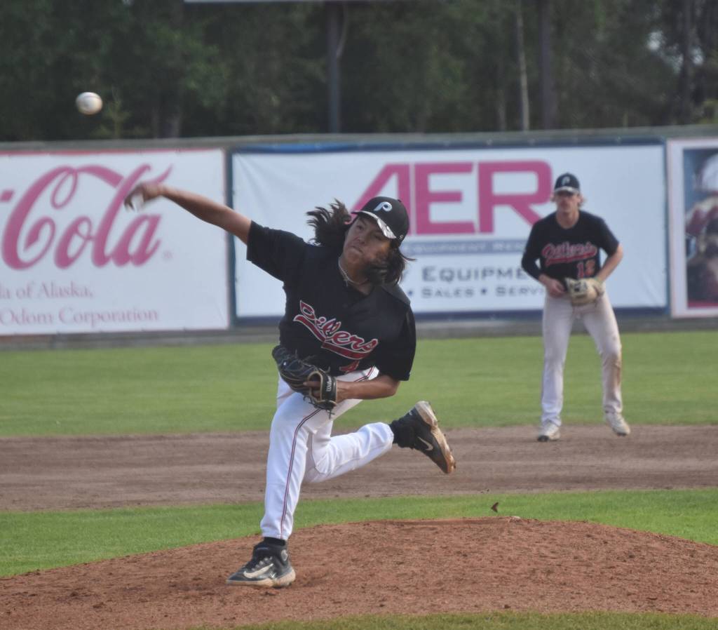 Peninsula Oilers pitcher Sam Silversmith delivers to the Chugiak-Eagle River Chinooks on Thursday, July 27, 2023, at Coral Seymour Memorial Park in Kenai, Alaska. (Photo by Jeff Helminiak/Peninsula Clarion)