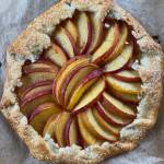 Fresh ripe peaches are wrapped in a buttery crust in this peach galette recipe. (Photo by Tressa Dale/Peninsula Clarion)