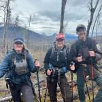 Biology field crew after collecting Dall Sheep scat to determine plant species composition in their diet. (Photo by USFWS/Colin Canterbury)