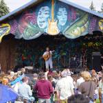 A crowd gathers for a performance by Discopians on the Ocean Stage at Salmonfest in Ninilchik, Alaska, on Friday, Aug. 4, 2023. (Jake Dye/Peninsula Clarion)