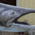 A salmon sculpture greets attendees at Salmonfest on Friday, Aug. 4, 2023 in Ninilchik, Alaska. (Ashlyn OHara/Peninsula Clarion)