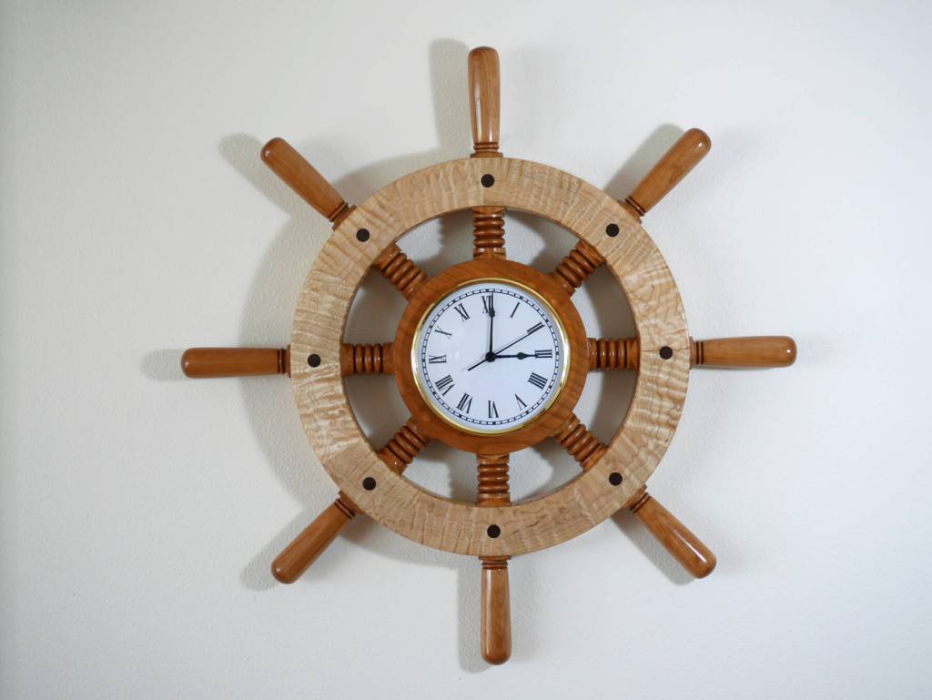 A wooden Ships Wheel Clock was created by Homer woodworker Ted Heuer, whose work is available year-round at Ptarmigan Arts, in 2018. Photo by Ted Heuer