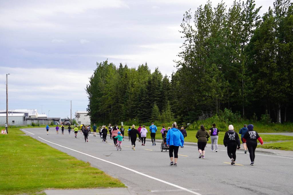 Participants of the 34th Annual Kenai Peninsula Violence Free Community Run set out in Kenai, Alaska, on Saturday, Aug. 12, 2023. (Jake Dye/Peninsula Clarion)