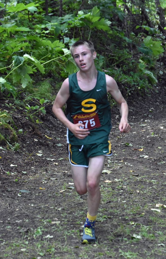 Seward freshman Ridge Conant finishes third in the freshman-sophomore boys race at the Class Races on Monday, Aug. 14, 2023, at Nikiski High School in Nikiski, Alaska. (Photo by Jeff Helminiak/Peninsula Clarion)