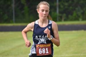 Soldotna sophomore Tania Boonstra runs to victory in the freshman-sophomore girls race at the Class Races on Monday, Aug. 14, 2023, at Nikiski High School in Nikiski, Alaska. (Photo by Jeff Helminiak/Peninsula Clarion)