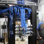 Kendall Kenai Peninsula Service Manager Josh Lee stands near electrical equipment inside a new service location and dealership on Wednesday, Aug. 16, 2023, in Soldotna, Alaska. (Ashlyn OHara/Peninsula Clarion)