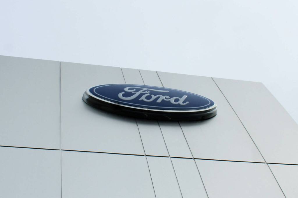 The Ford logo overlooks the Sterling Highway from Kendalls new service facility and dealership on Wednesday, Aug. 17, 2023, in Soldotna, Alaska. (Ashlyn OHara/Peninsula Clarion)