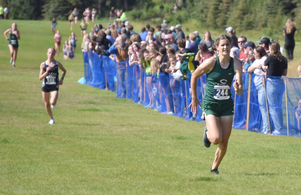 Colonys Ella Hopkins runs to victory in the girls varsity race at the Ted McKenney Invitational on Saturday, Aug. 19, 2023, at Tsalteshi Trails just outside of Soldotna, Alaska. (Photo by Jeff Helminiak/Peninsula Clarion)
