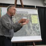 Hydrologist Jim Munter talks about flood problems along Kalifornsky Beach Road during a public meeting on Thursday, Aug. 17, 2023, in Soldotna, Alaska. (Ashlyn OHara/Peninsula Clarion)