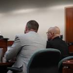Soldotna Police Officer David Bower, right, sits with his lawyer, Andy Pevehouse, during a bail hearing at the Kenai Courthouse in Kenai, Alaska, on Aug. 16, 2023. (Jake Dye/Peninsula Clarion)