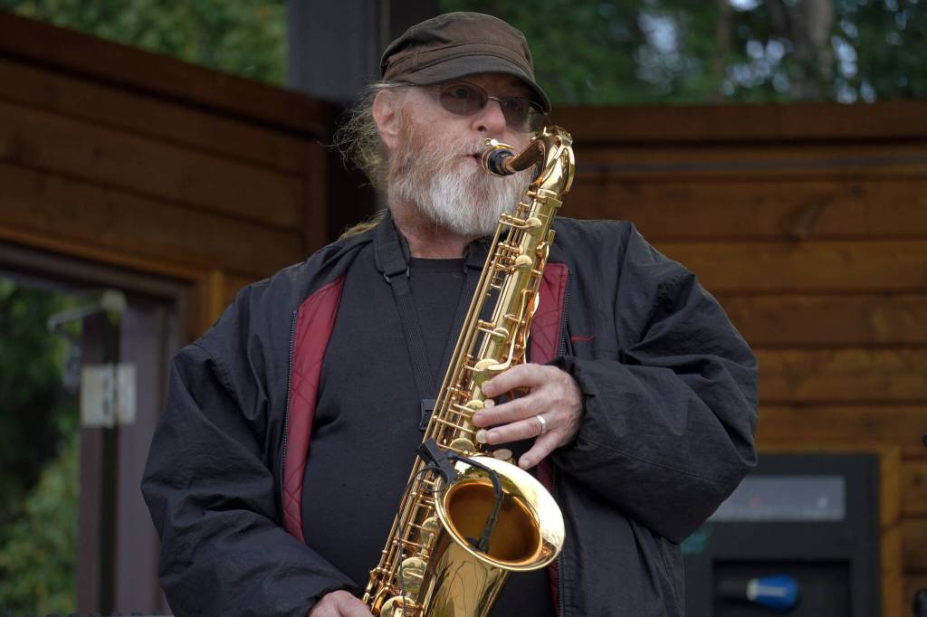 Bob Mabrey performs as part of Riverfront Gang at Soldotna Creek Park in Soldotna, Alaska, on Wednesday, Aug. 23, 2023. (Jake Dye/Peninsula Clarion)