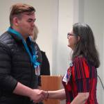 Kenneth Coghill II receives a certified nurse assistant pin from Ana Monyahan at a CNA graduation ceremony at Central Peninsula Hospital in Soldotna, Alaska, on Friday, Aug. 25, 2023. (Jake Dye/Peninsula Clarion)