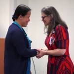 Josie Sudario receives a certified nurse assistant pin from Ana Monyahan at a CNA graduation ceremony at Central Peninsula Hospital in Soldotna, Alaska, on Friday, Aug. 25, 2023. (Jake Dye/Peninsula Clarion)