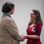 Monica Partida Bravo Moe receives a certified nurse assistant pin from Ana Monyahan at a CNA graduation ceremony at Central Peninsula Hospital in Soldotna, Alaska, on Friday, Aug. 25, 2023. (Jake Dye/Peninsula Clarion)