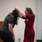 Jessica Reser receives a certified nurse assistant pin from Ana Monyahan at a CNA graduation ceremony at Central Peninsula Hospital in Soldotna, Alaska, on Friday, Aug. 25, 2023. (Jake Dye/Peninsula Clarion)