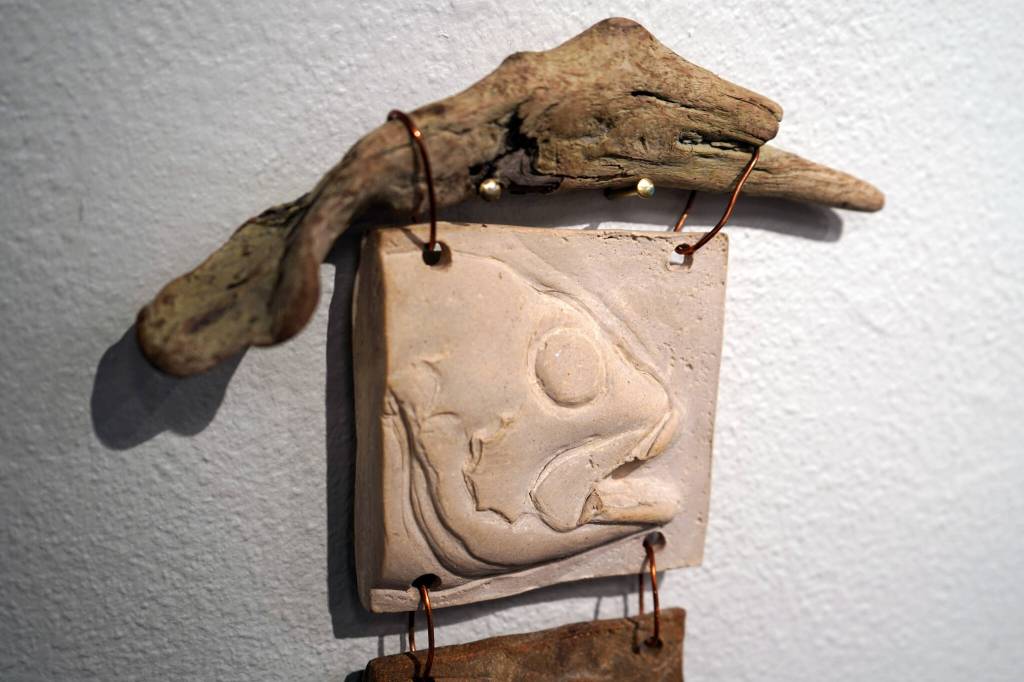 Artwork donated for the Harvest Auction hangs at the Kenai Art Center in Kenai, Alaska, on Tuesday, Aug. 29, 2023. (Jake Dye/Peninsula Clarion)