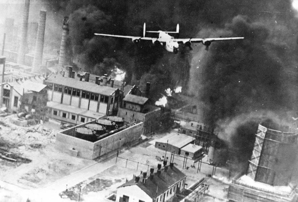 Public photo from the 44th Bomb Group Collection
A U.S. bomber nicknamed Sandman soars over an enemy fuel refinery in Romania on Aug. 1, 1943. Larry Lancashire was part of this U.S. mission and was shot down and captured.