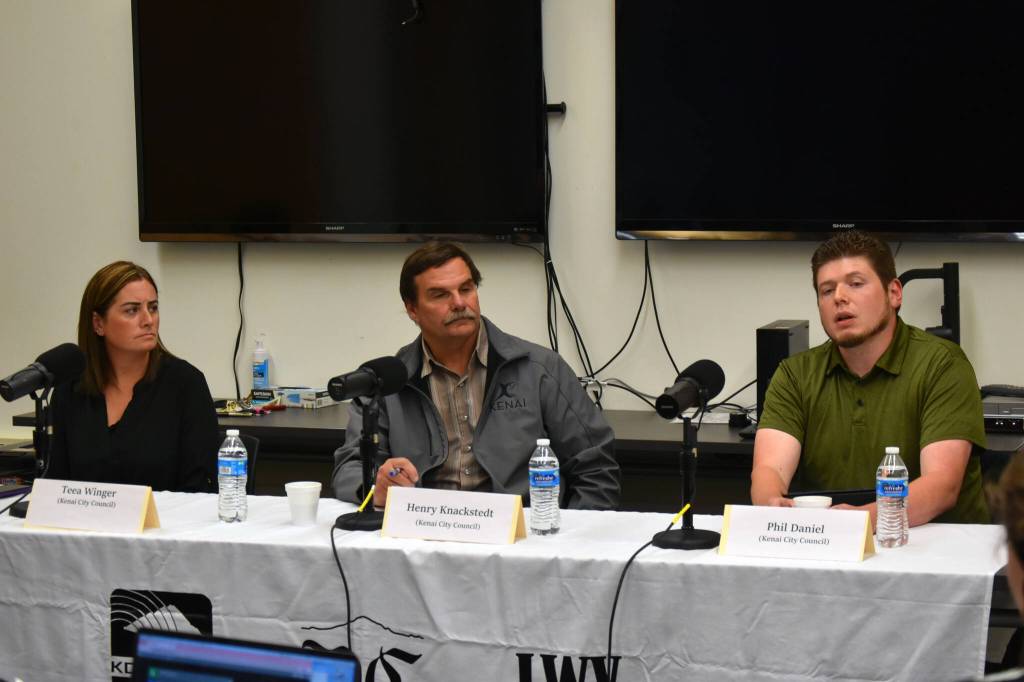 Teea Winger, Henry Knackstedt and Phil Daniel participate in a Kenai City Council candidate forum at the Kenai Community Library in Kenai, Alaska, on Thursday, Sept. 7, 2023. (Jake Dye/Peninsula Clarion)