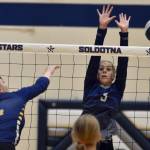 Soldotnas Sarah Brown puts up a block on Homers Channing Lowney on Thursday, Sept. 7, 2023, at Soldotna High School in Soldotna, Alaska. (Photo by Jeff Helminiak/Peninsula Clarion)