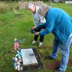 Kenai Historical Society President June Harris (left) and Victoria Askin (right) photograph headstones as part of the City of Kenais cemetery imaging project on Friday, Sept. 8, 2023 in Kenai, Alaska. (Ashlyn OHara/Peninsula Clarion)