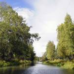 Water flows over Big Eddy Road in Soldotna, Alaska, on Wednesday, Sept. 13, 2023. (Jake Dye/Peninsula Clarion)